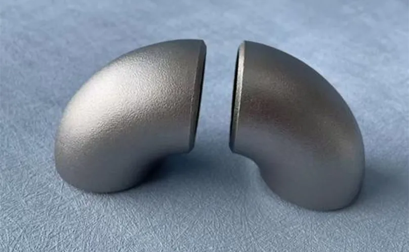 How do elbow manufacturers identify stainless steel elbows?